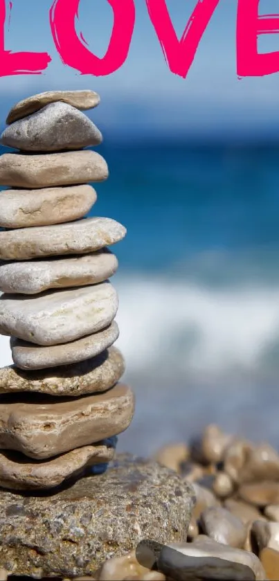 Stacked stones on a beach with a vibrant blue sky.