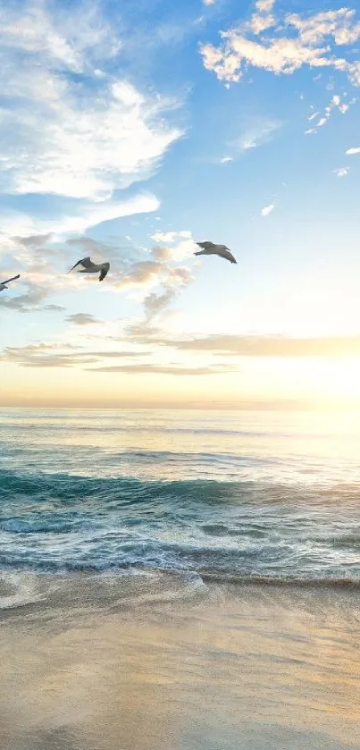 Serene seaside sunrise with waves and seagulls under a clear blue sky.