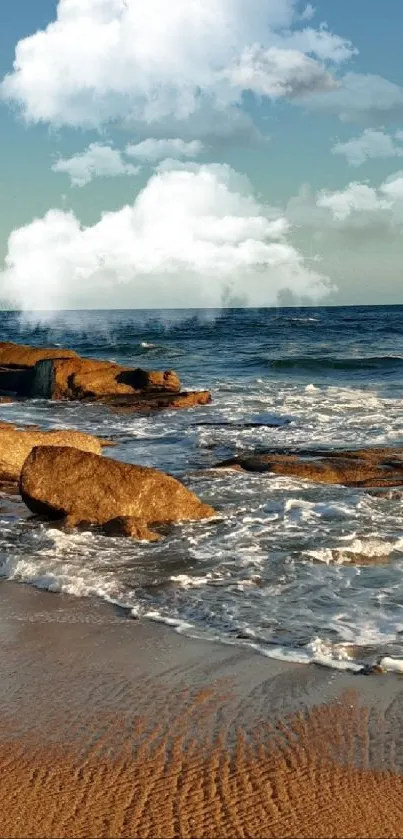 Serene beach with waves crashing on rocks under a blue sky.