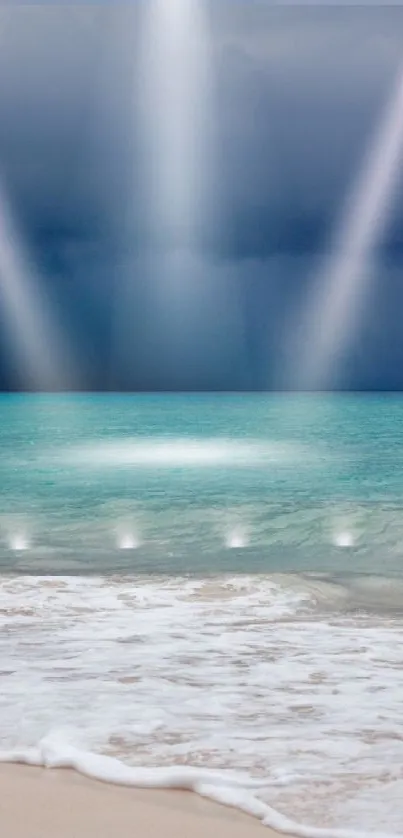 Serene beach with rays of light shining down on the calm ocean.