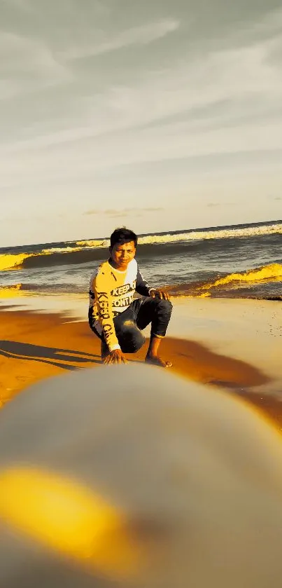 A person enjoys a serene beach sunset with golden waves and a tranquil horizon.