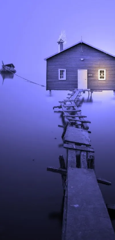 Serene blue cottage with misty dock on a tranquil lake at sunrise.