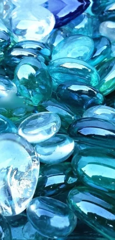 Close-up of blue glass stones forming a calming wallpaper pattern.