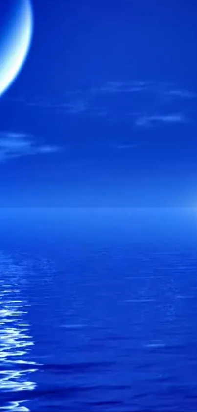 A serene blue ocean under a night sky with a glowing moon reflecting on the water.