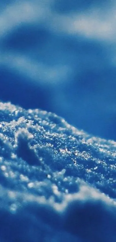 Close-up of a blue textured surface with abstract waves.