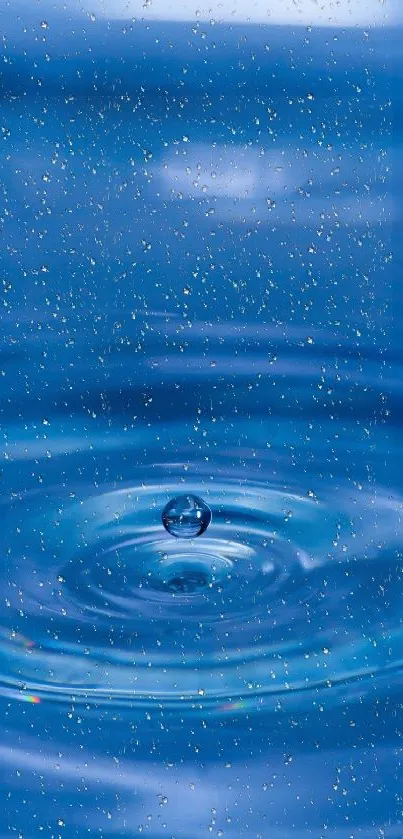 Serene blue wallpaper with water droplet and ripple.