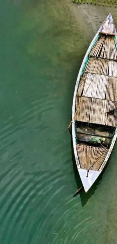 Wooden boat resting on calm blue water.