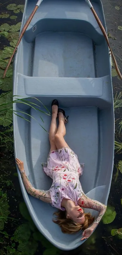 Woman relaxing in a boat surrounded by lily pads.