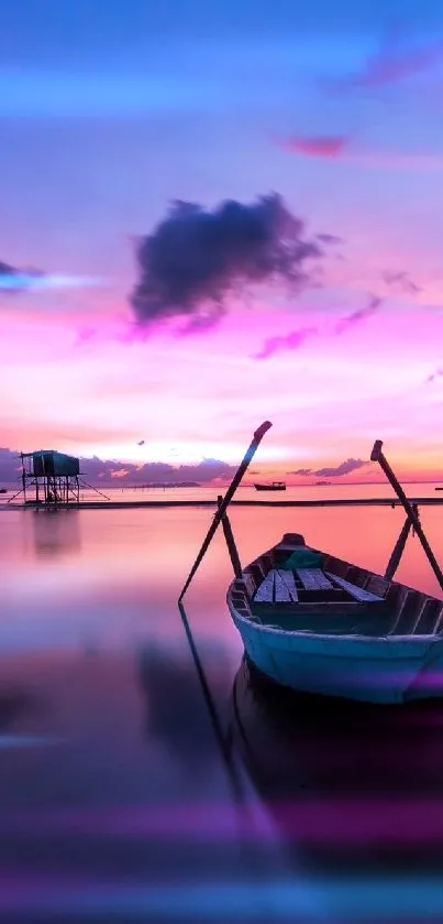 Tranquil boat on a calm sea at sunset with vibrant purple and pink hues.