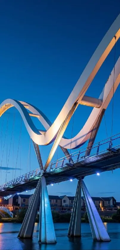 A modern bridge at dusk with water reflections and a serene blue sky.