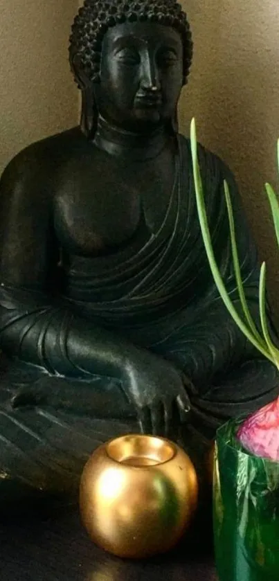 Buddha statue with plants and candle on a serene corner.