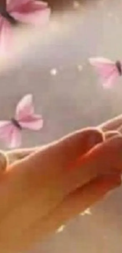 A serene wallpaper with pink butterflies and a softly lit hand.