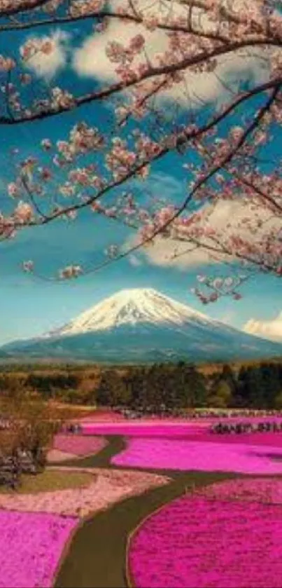 Cherry blossoms and mountains under blue sky.