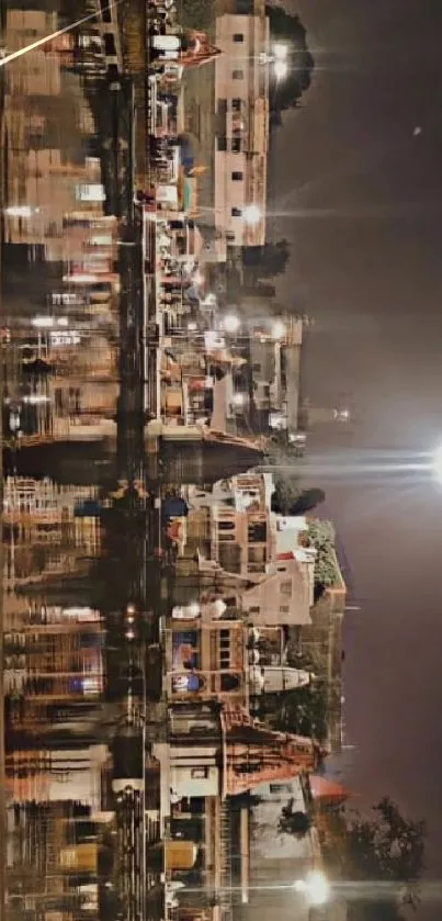 Illuminated cityscape reflected on water at night.