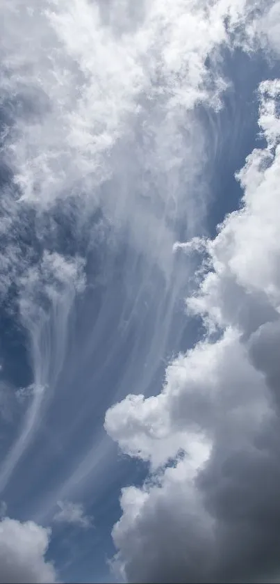 Blue sky with fluffy white clouds mobile wallpaper.