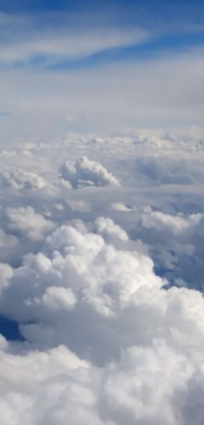 A serene cloudscape with fluffy clouds against a vibrant blue sky.