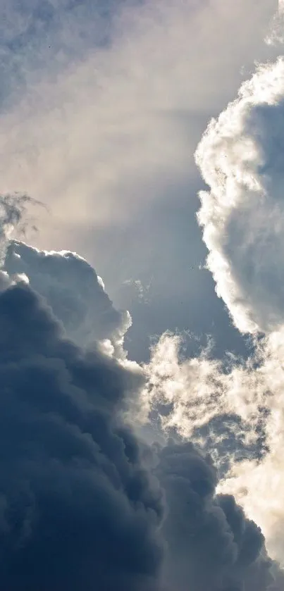 Serene clouds against a blue sky wallpaper