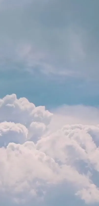 Fluffy white clouds against a blue sky backdrop.