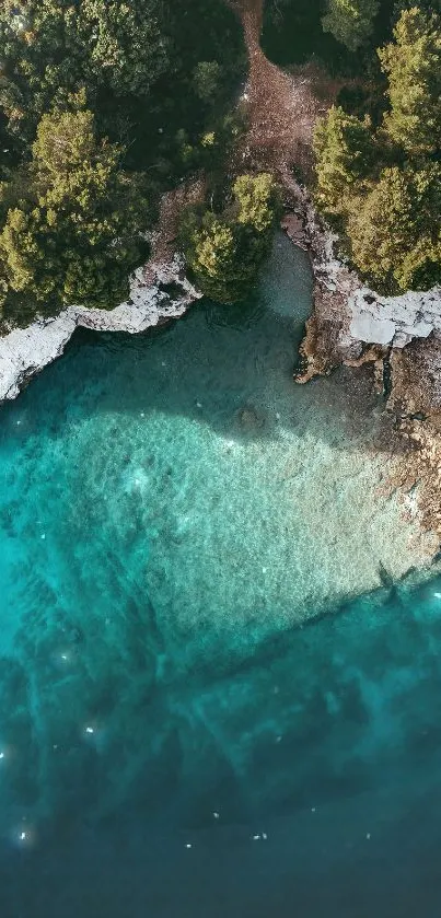 Aerial view of a serene coastline with clear blue waters.