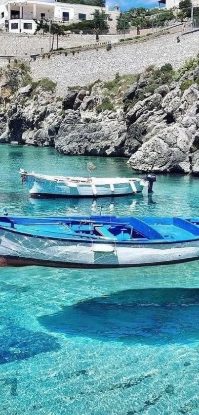 Blue boats float in clear turquoise waters by rocky cliffs and a charming village.