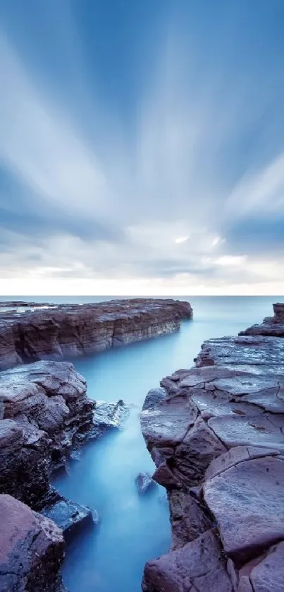 Serene coastal landscape with cliffs and blue skies.