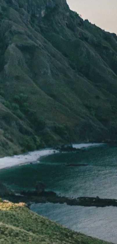 Serene coastline with mountain backdrop, perfect for a peaceful mobile wallpaper.