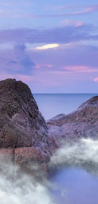 Serene wallpaper with coastal rocks and purple sky.