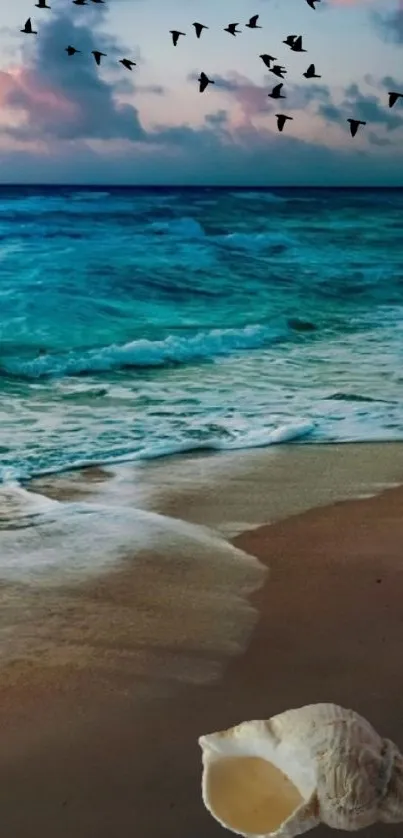 Serene coastal landscape with ocean, beach, sunset, and birds in flight.