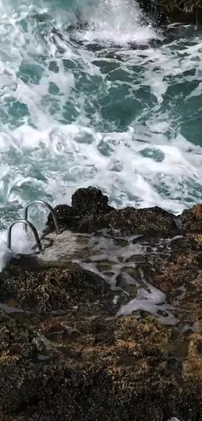 Serene wallpaper of ocean waves crashing on rocky shoreline.