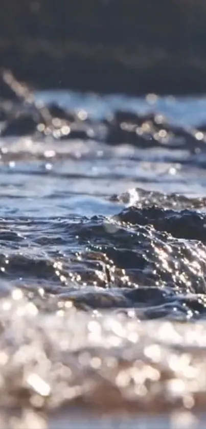 Close-up view of serene coastal waves gently hitting rocky shores.