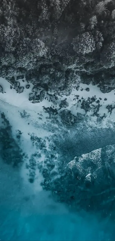 Aerial view of a serene rocky coastline and blue ocean.