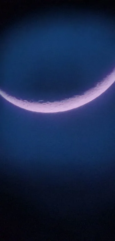 Blue-themed wallpaper with a crescent moon against a dark background.