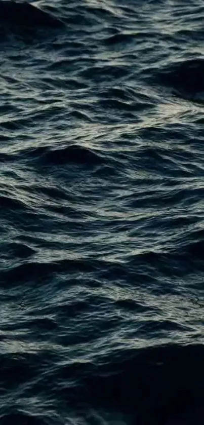 Dark ocean waves create a calming phone wallpaper.