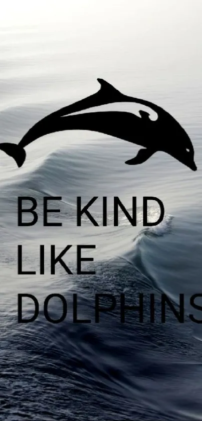 Serene ocean wallpaper with a dolphin and 'Be Kind Like Dolphins' text.