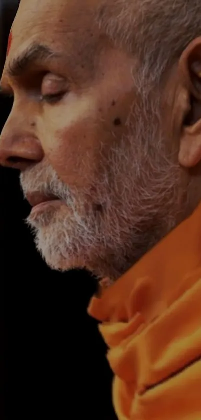 Peaceful portrait of an elder meditating in soft orange hues.