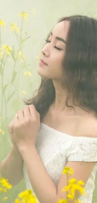 Woman in white dress amid yellow flowers.