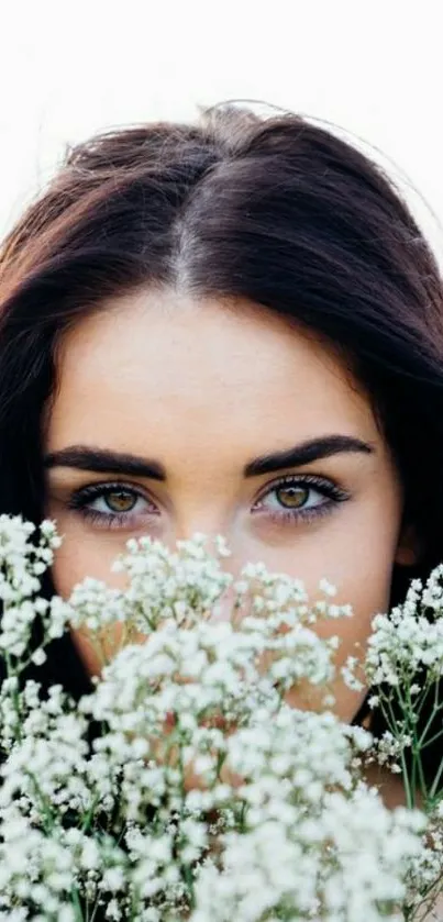 Portrait wallpaper with flowers and captivating eyes.