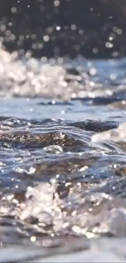 Mobile wallpaper featuring serene flowing water under soft light.