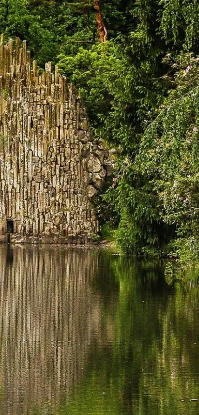 Forest rock structure reflecting on a still lake.