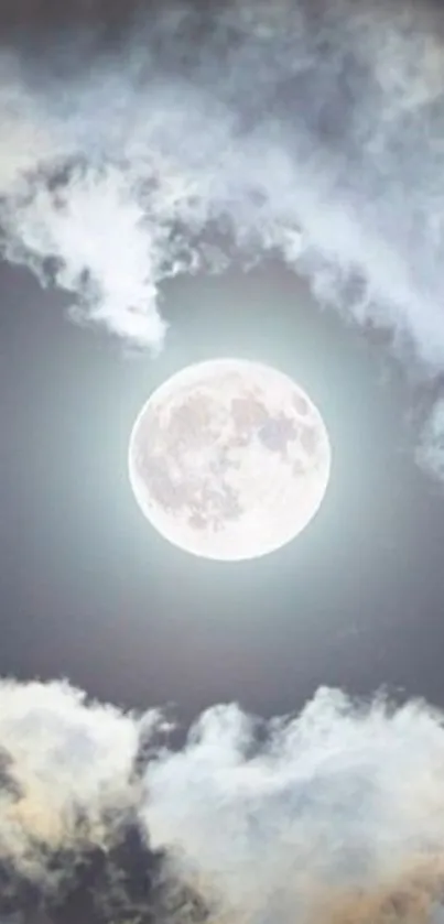 Full moon with glowing clouds in a serene night sky.