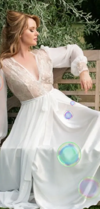 Woman in a white dress on a garden bench surrounded by greenery.