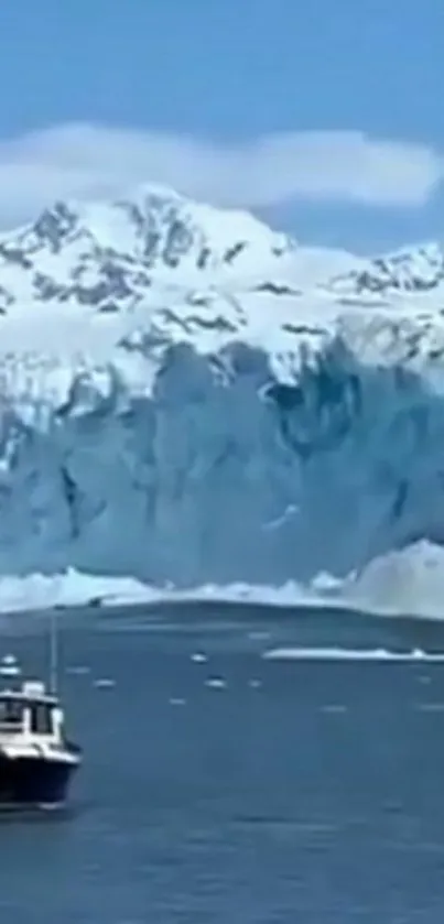 Scenic view of a glacier with a boat on a blue water surface.