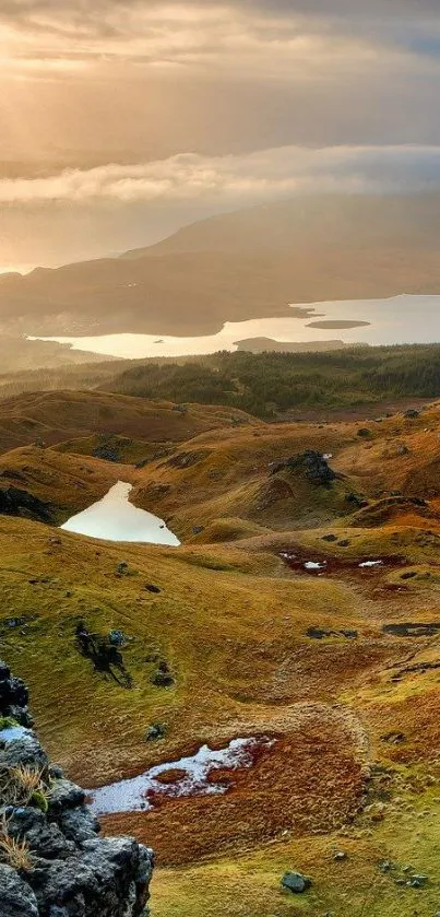 Golden landscape with hills and water in serene mobile wallpaper.