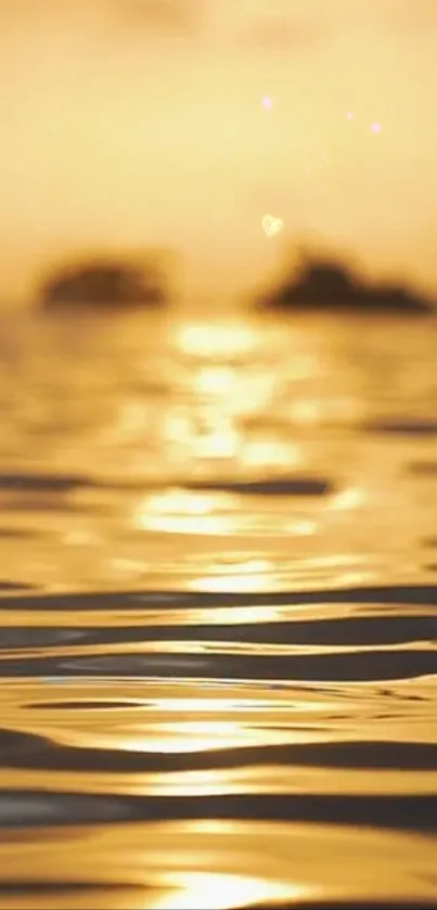 Golden sunset reflecting on tranquil ocean waves.