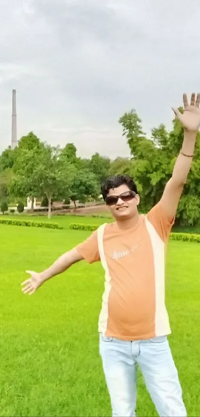 Person enjoying a sunny day in a lush green park.