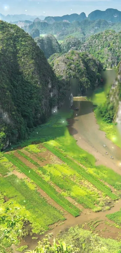 Green valley with scenic cliffs and a winding river on a clear day.