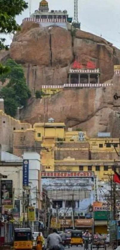 Hilltop temples and bustling city street view.