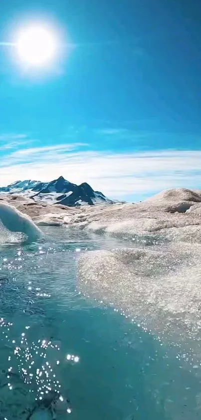 Icy mountains with blue sky and sunlight on mobile wallpaper.