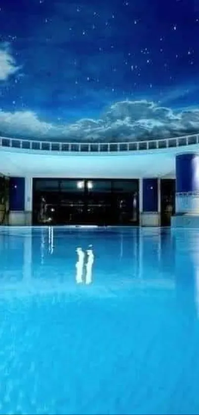 Luxurious indoor pool under a starry blue ceiling.