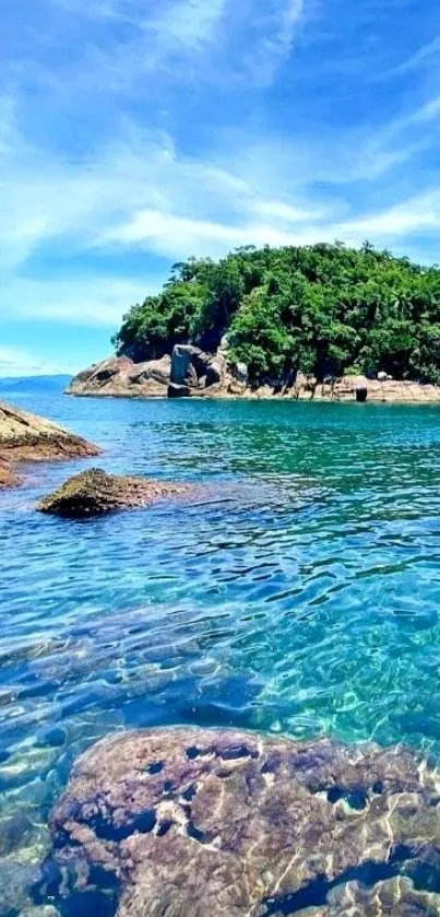 Serene island with blue waters and lush greenery wallpaper.